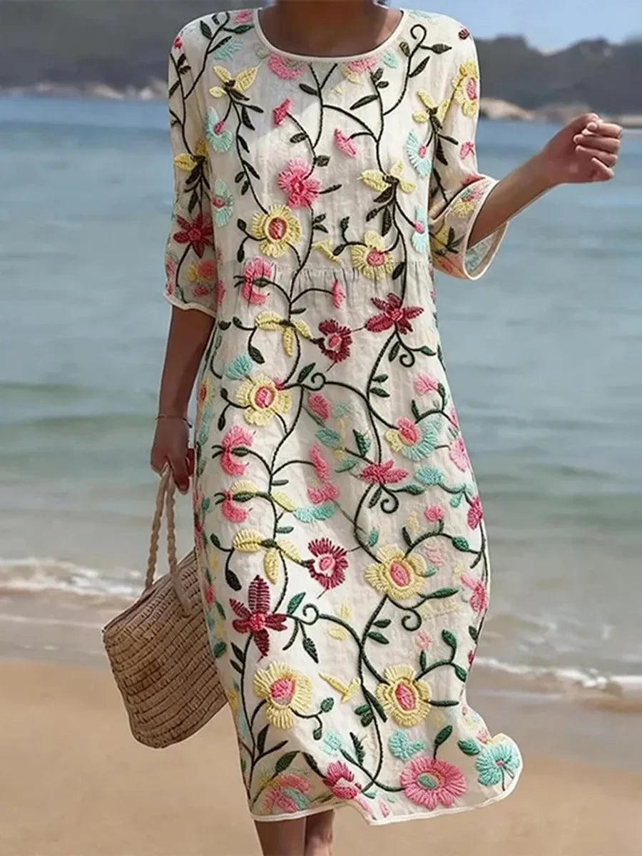 CAROLINE™ | AVSLAPPET BLOMSTERPRINT STRANDKJOLE